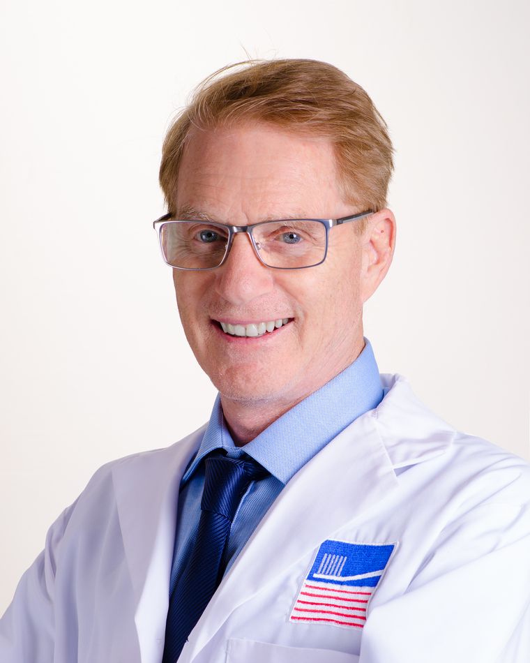 Dr. Michael R. Ziegler, CEO & Medical Director of American Dental Clinic